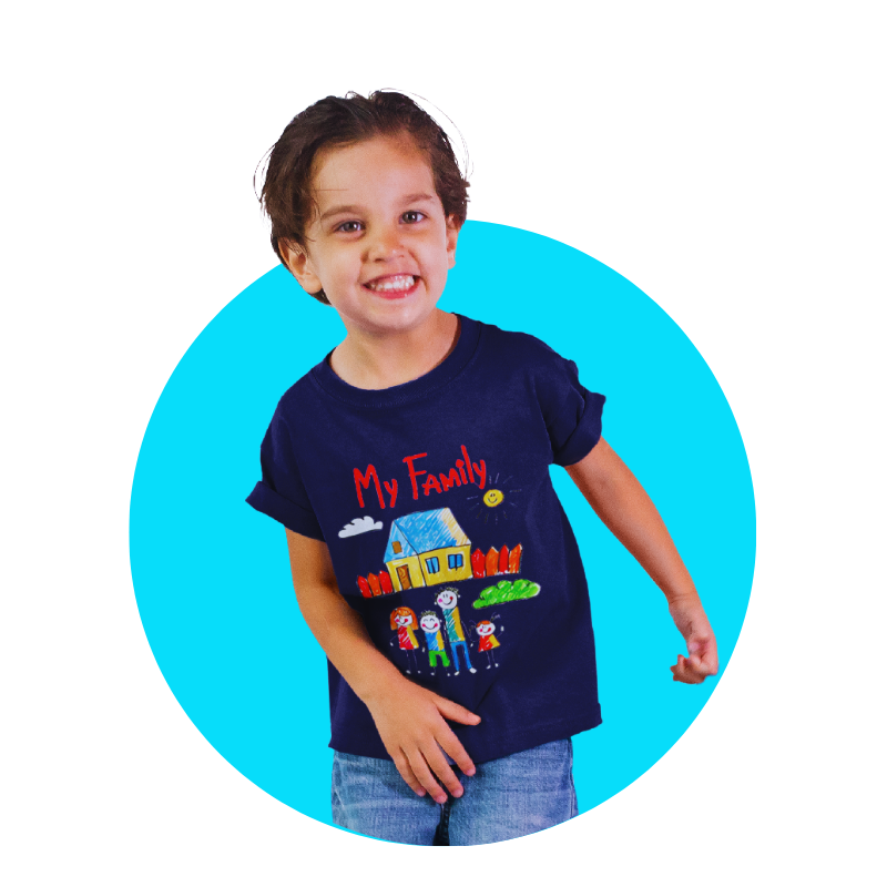 A smiling boy wearing a dark blue 'My Family' t-shirt with a hand-drawn family and house design.