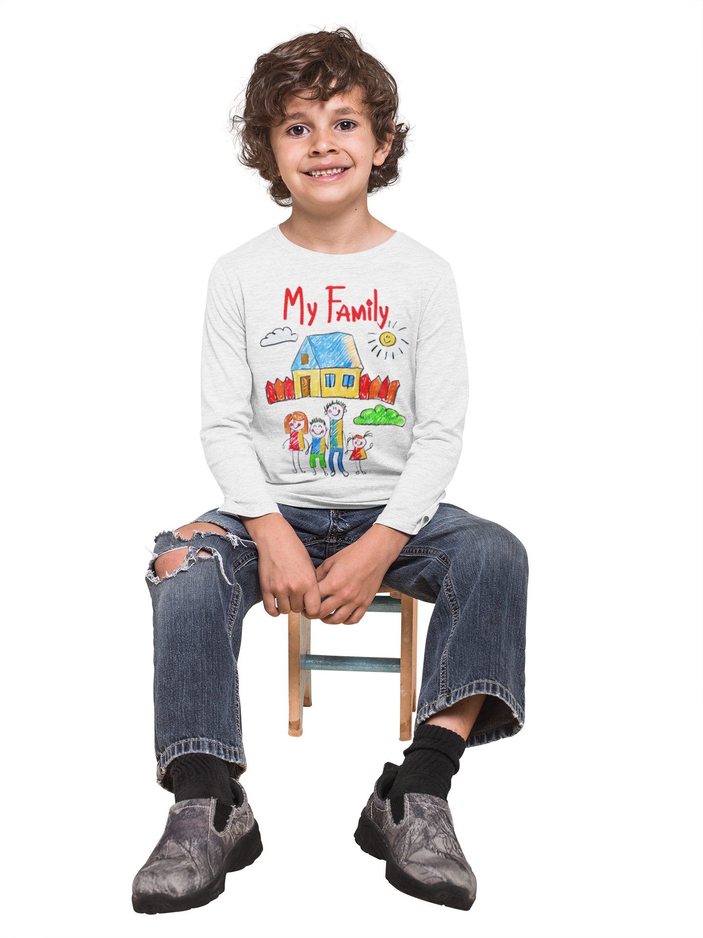 A boy wearing a "My Family" t-shirt, sitting on a small chair.